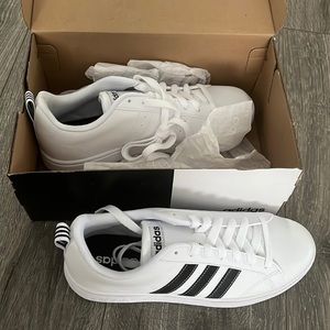 Women’s white adidas sneakers